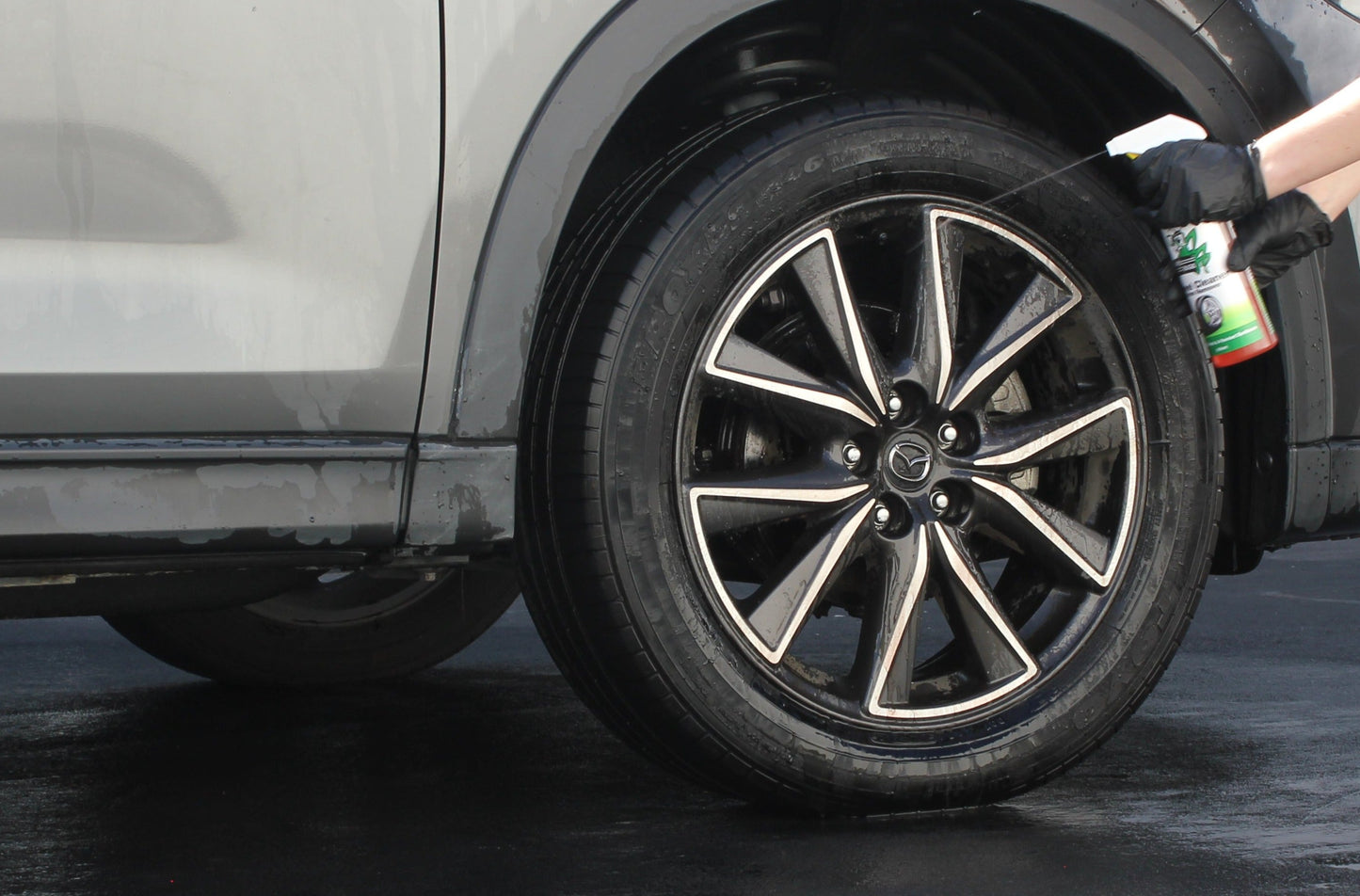 Wheel Cleaner and Iron Remover spraying