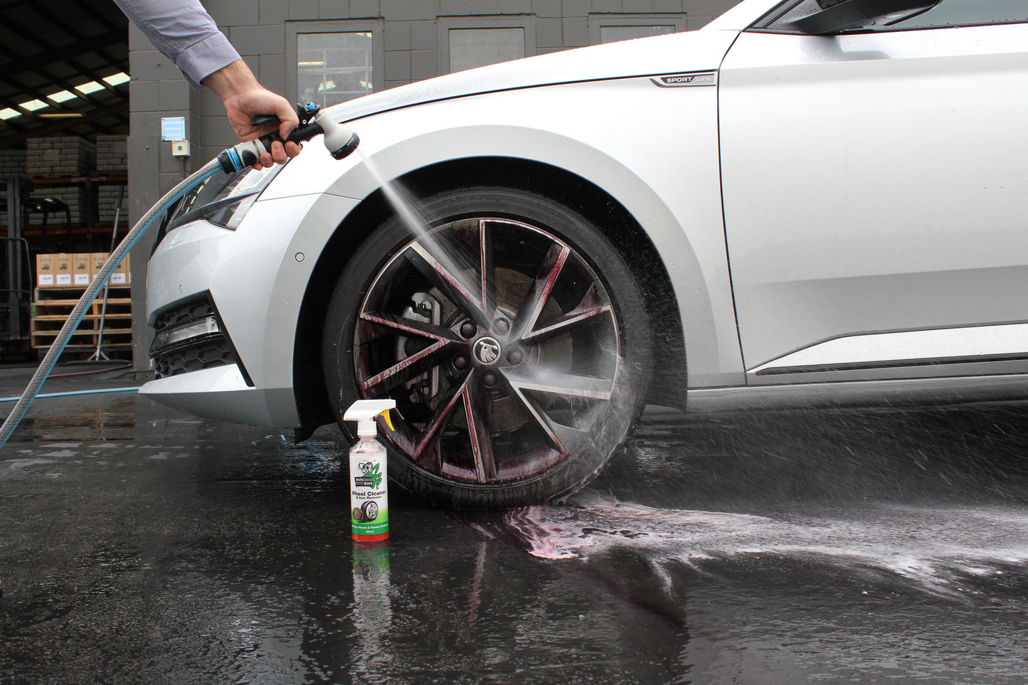 Wheel Cleaner Spraying Off Purple brake dust