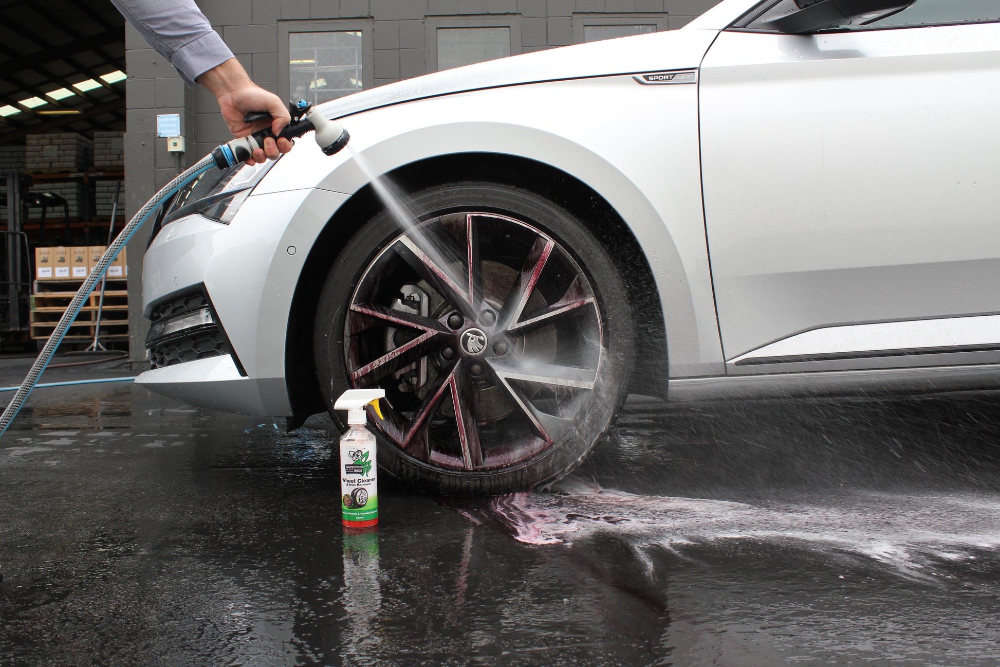 Wheel Cleaner Spraying Off Purple brake dust